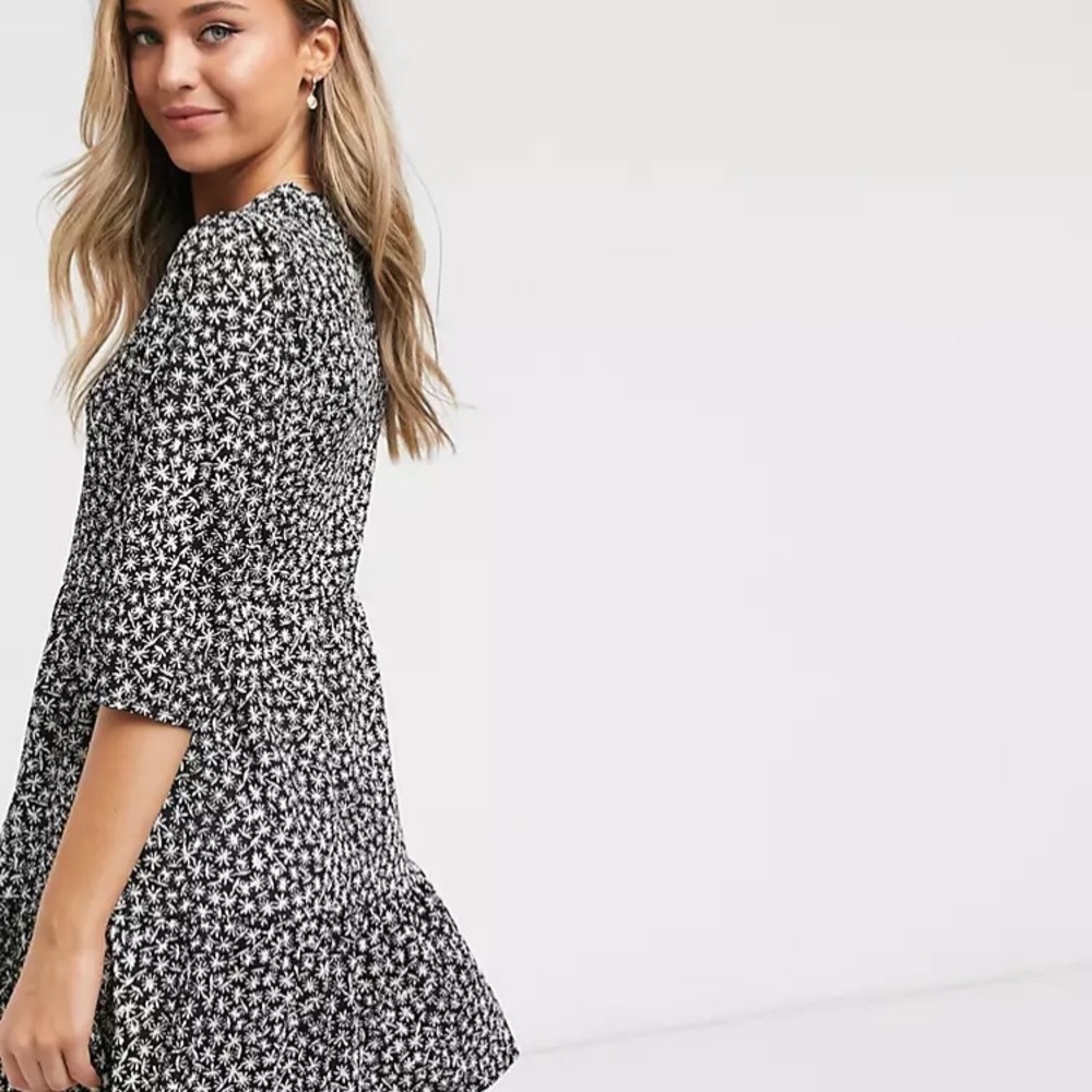 Tiered mini dress in a Black & White Daisy printed